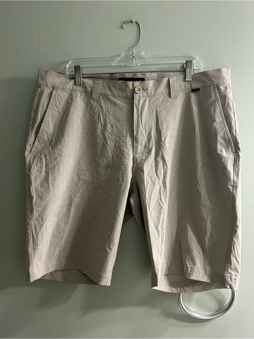 Travis Matthew gold shorts beige